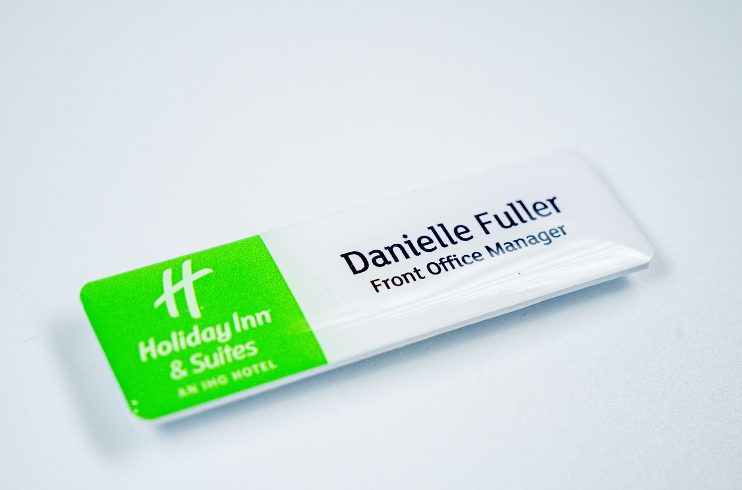 Acrylic name badge with resin coating